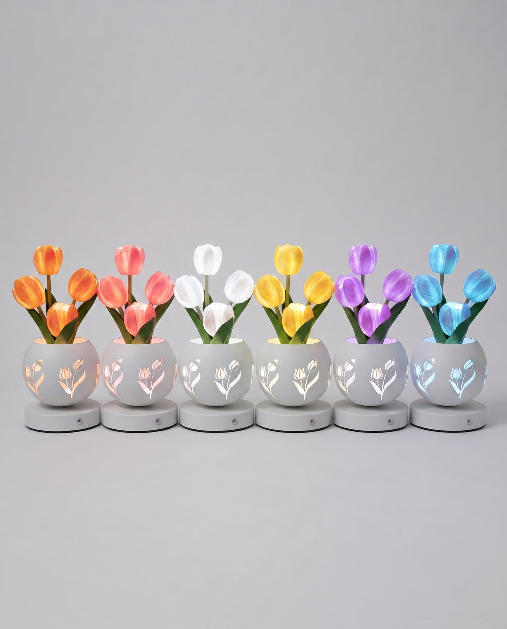 Los 6 colores disponibles de la lámpara tulipán LED: azul, naranja, rosa, morado, blanco y amarillo
