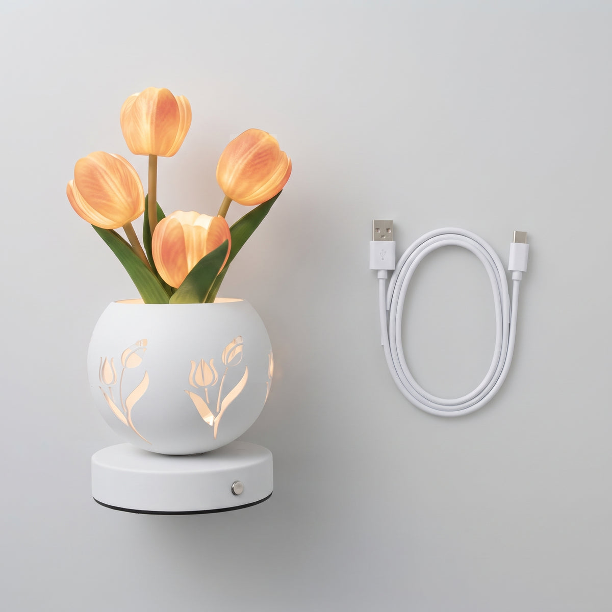 Lámpara tulipán LED junto a su cable de carga USB incluido
