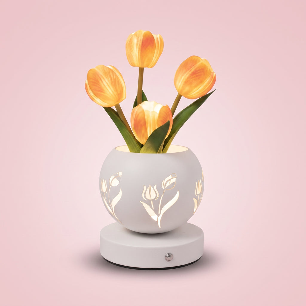 Lámpara tulipán LED encendida sobre fondo rosa pastel, vista de producto